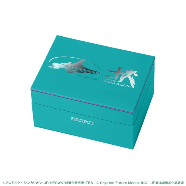 青緑色のギフトボックスで、SEIKOのロゴと「シンカリオン 10th Anniversary」の記念ロゴが銀色でデザイン