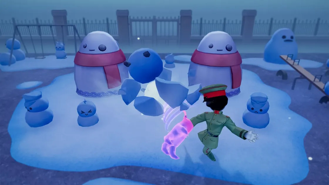 雪に覆われた公園で、軍服を着たキャラクターが、光を放ちながら砕け散る青い球体に魔法のような力を使っている。