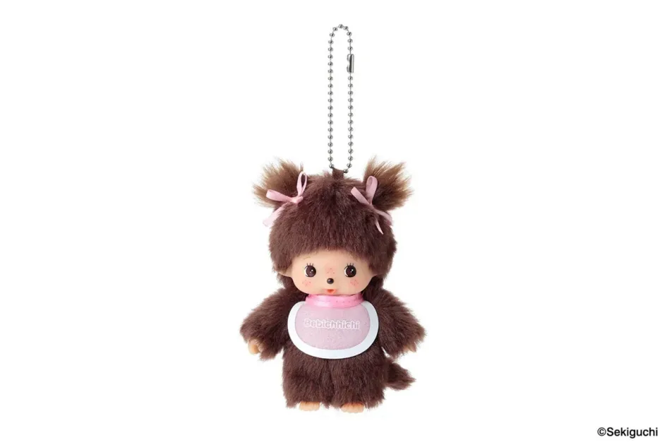 ピンクのスタイをつけたベビチッチ女の子キーチェーン